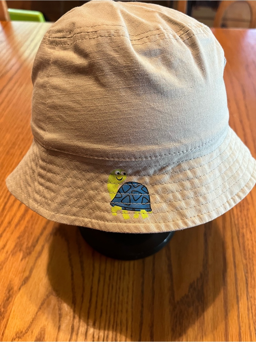 Beige Kids Bucket Hat with Playful Turtle Accent